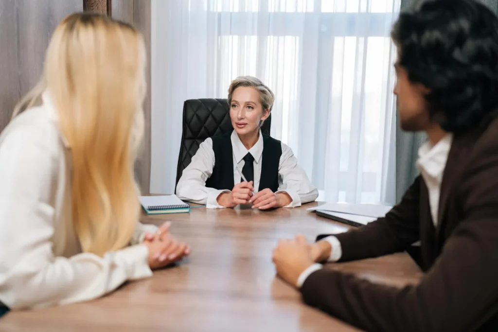 Mediator consulting a client.