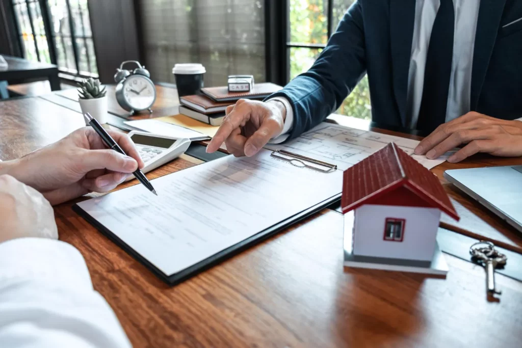 Conveyancing lawyer assisting a client.